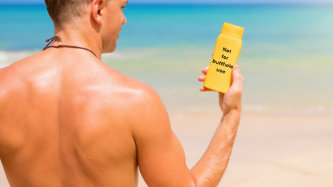 humorous image of man holding sunscreen bottle saying 'not for butthole use'