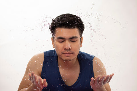 washing the face before shaving