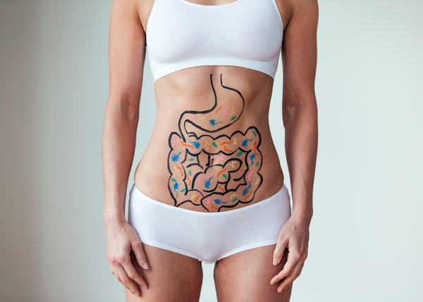 Woman with drawing on her stomach showing why to avoid Gluten