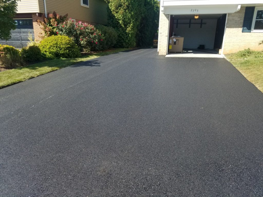 newly asphalt sealed driveway