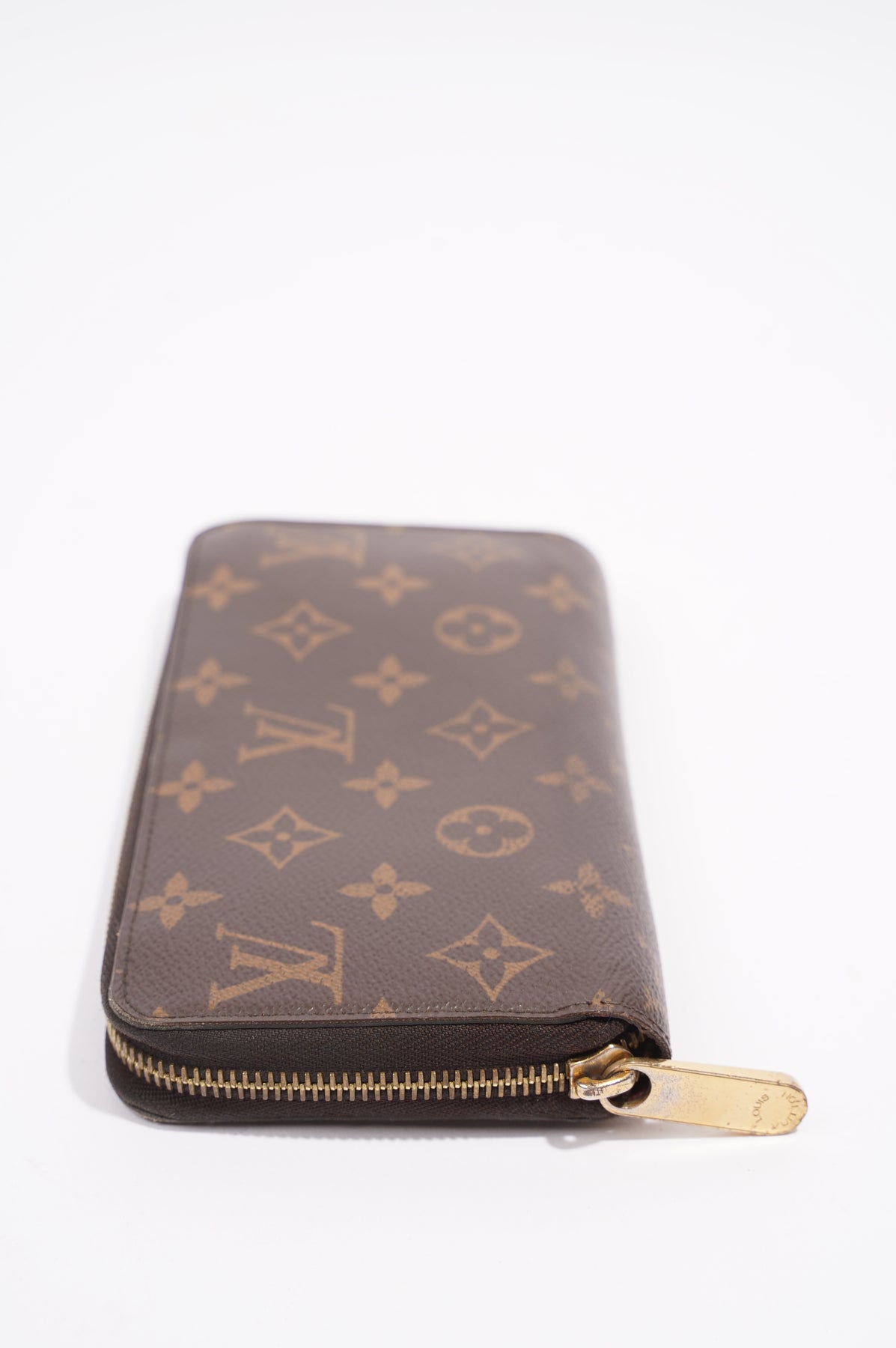 Sold at Auction: A Louis Vuitton Zippy XL Gents Wallet. Monogram