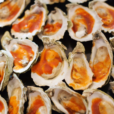 Game day snacks, oysters with compound butter