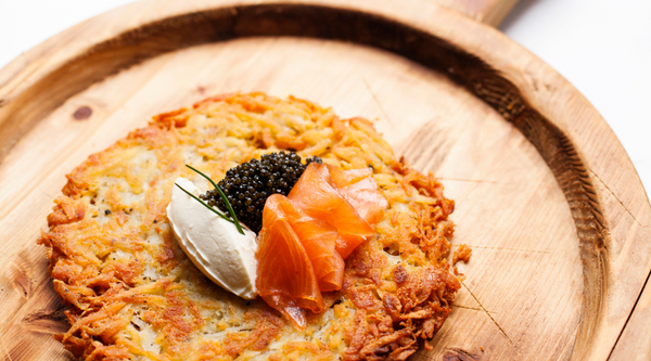 Rosti topped with creme fraiche smoked salmon and caviar