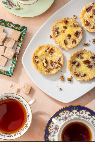 tarts and tea and sugar cubes laid out for Easter Brunch