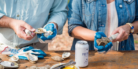Shucking oysters and drinking beer