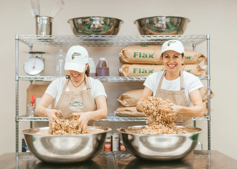 Rainbow Trout Kitchen granola being made by two women