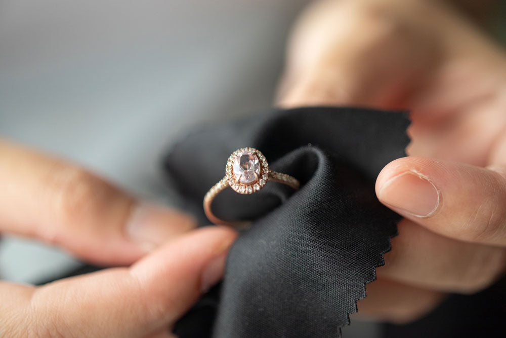 Cleaning a diamond ring with soapy water and a toothbrush. - Celebration  Jewelers