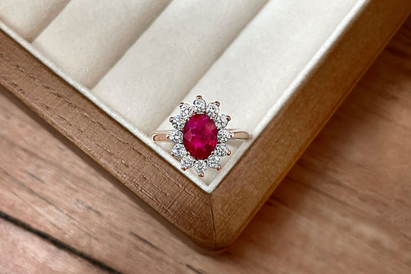 Diana vintage ruby and diamond halo engagement ring