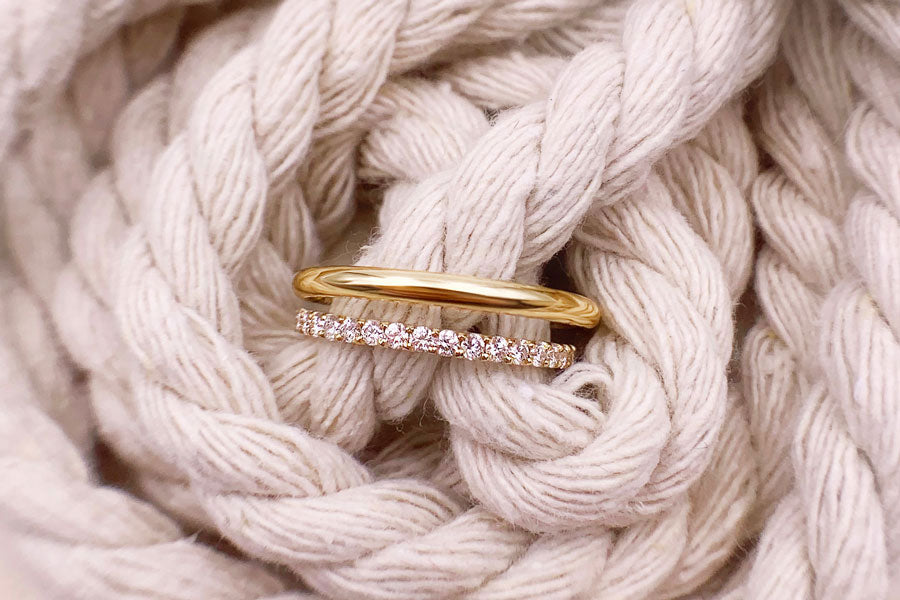 Plain yellow gold ring and diamond eternity ring