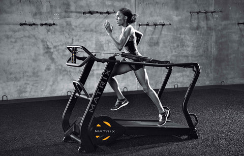 Athlete running on Matrix S Drive Trainer