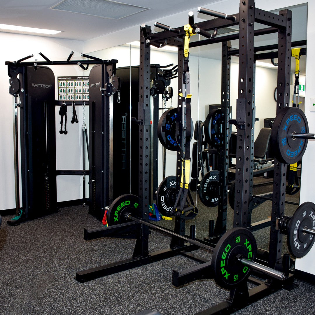 Functional trainers and half racks inside a physio