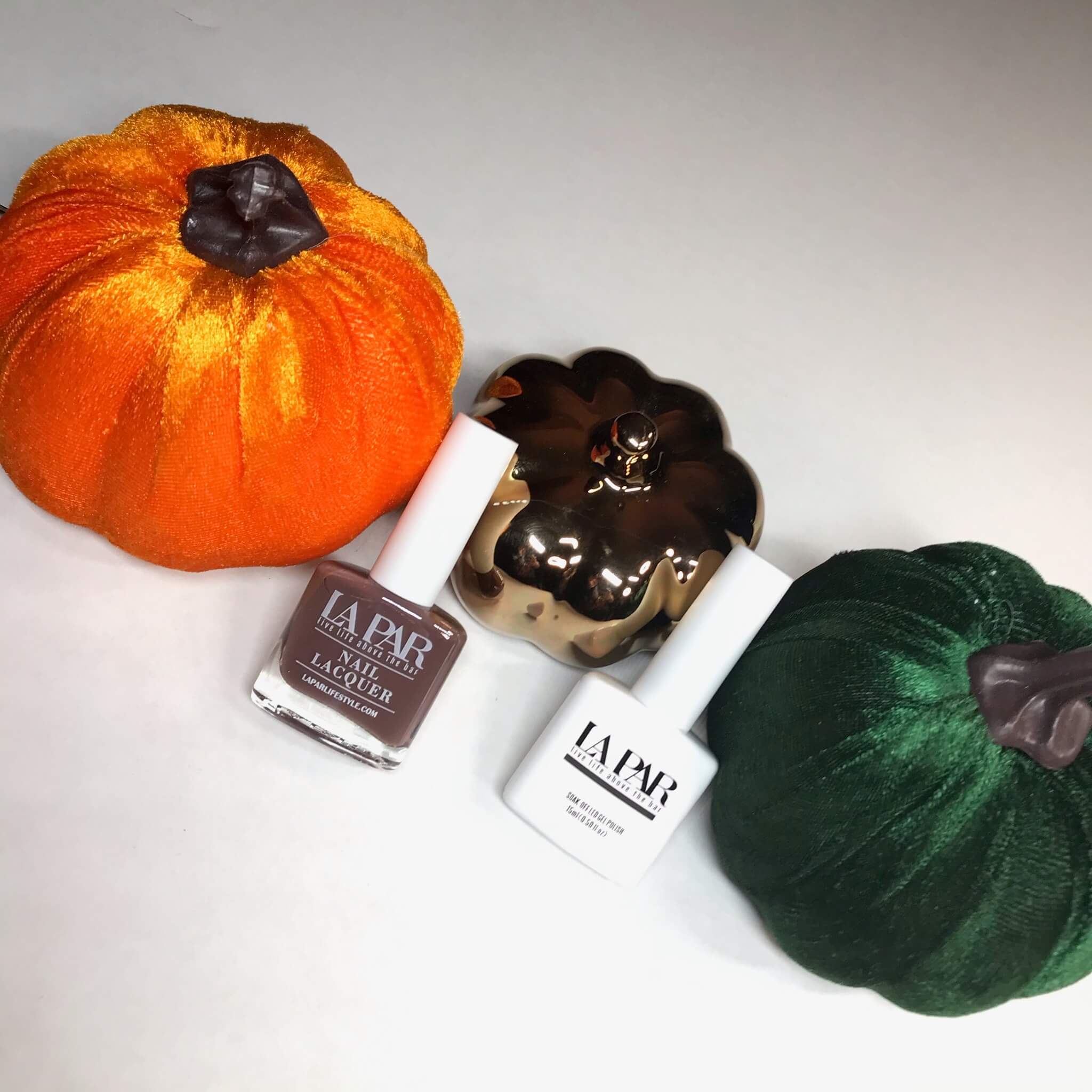 Fall La Par Nail polish with orange, gold and green pumpkins