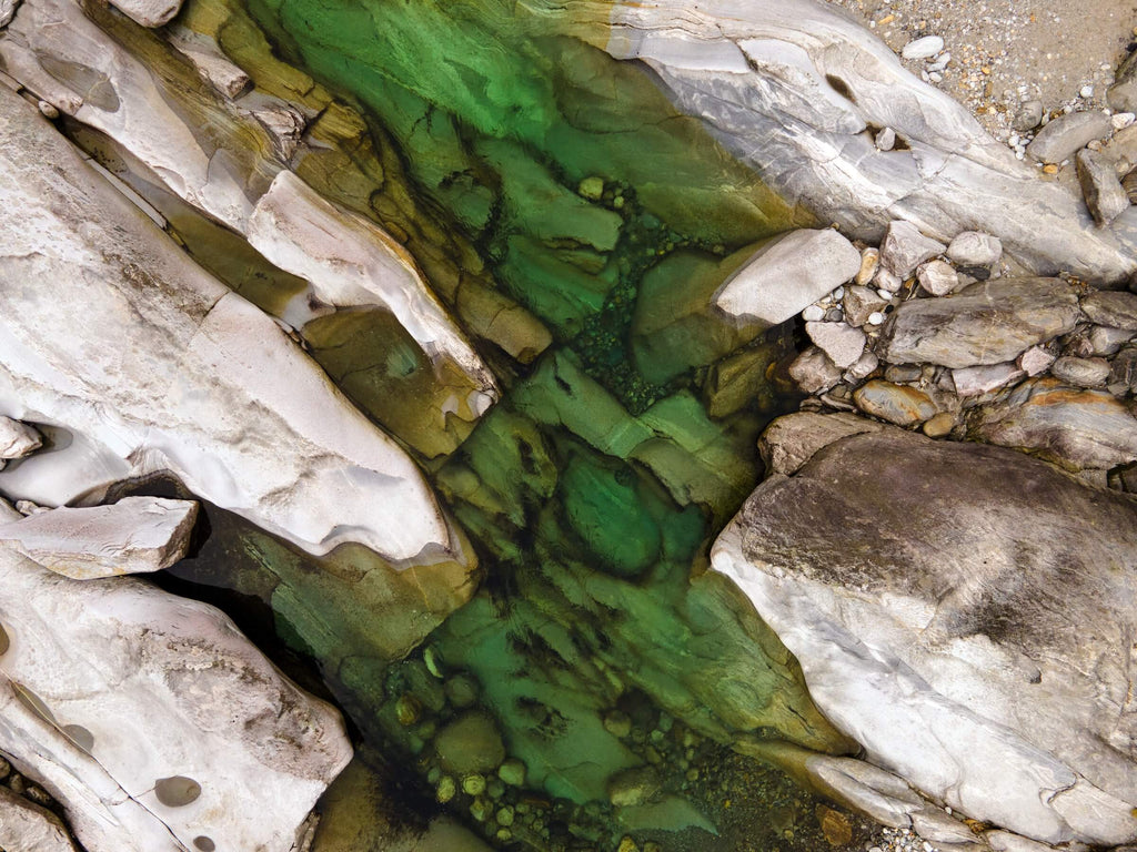 green and white water flowing in a river