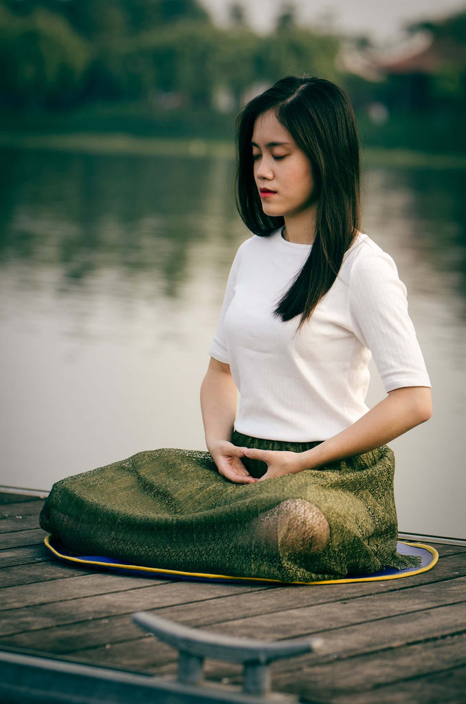 a girl meditating and relaxing