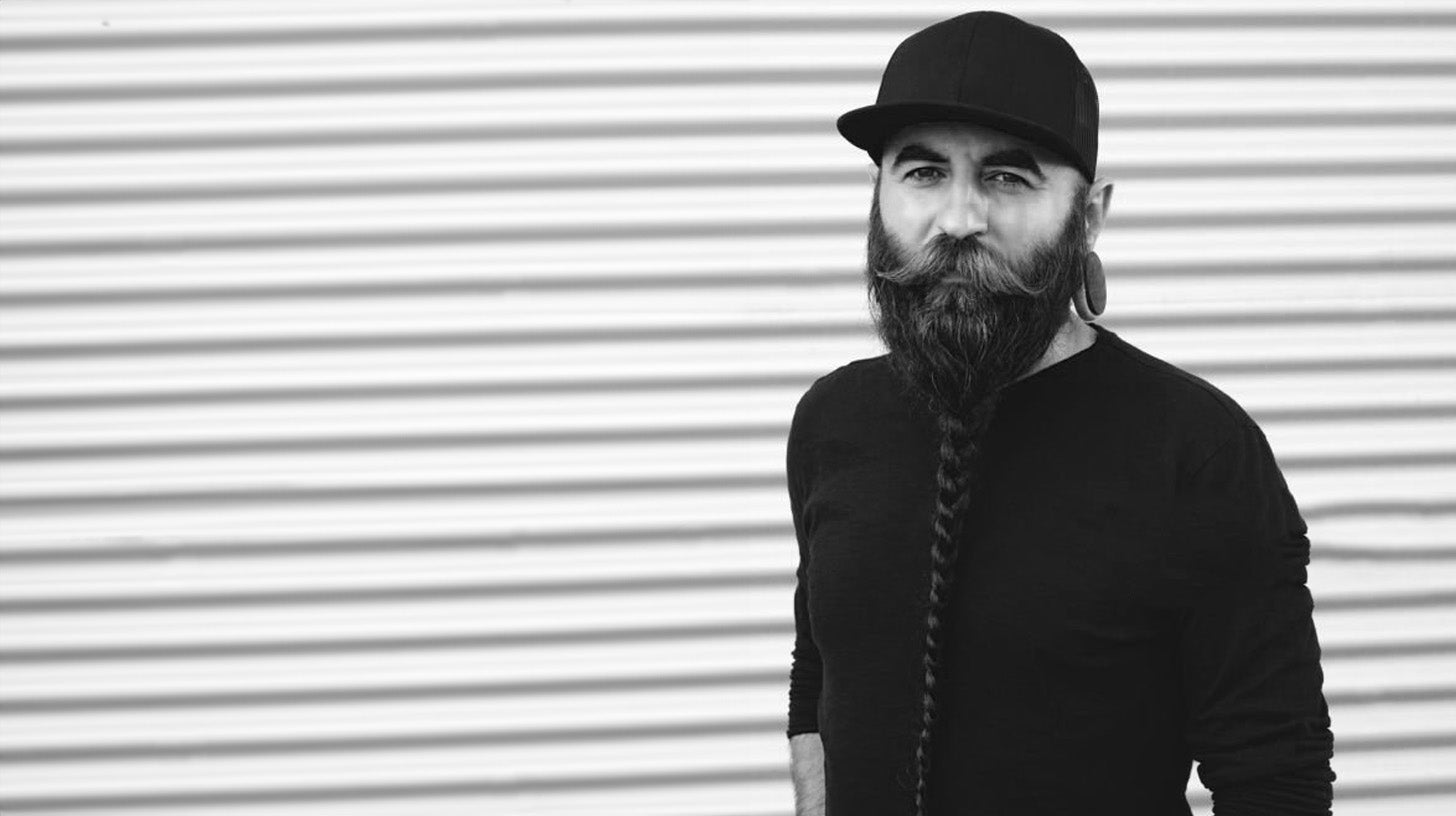 man with viking beard braid