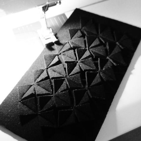 Texture neoprene square shapes made from upcycled wetsuits.