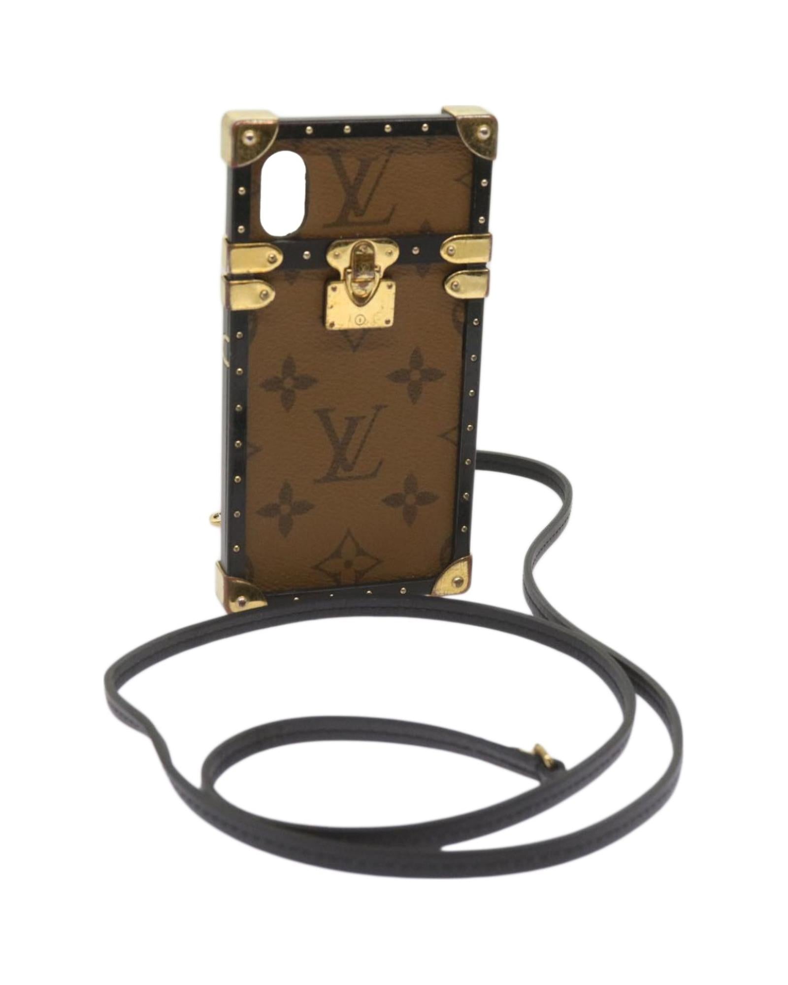 image of Monogram Reverse Eye Trunk iPhone X Case by Louis Vuitton