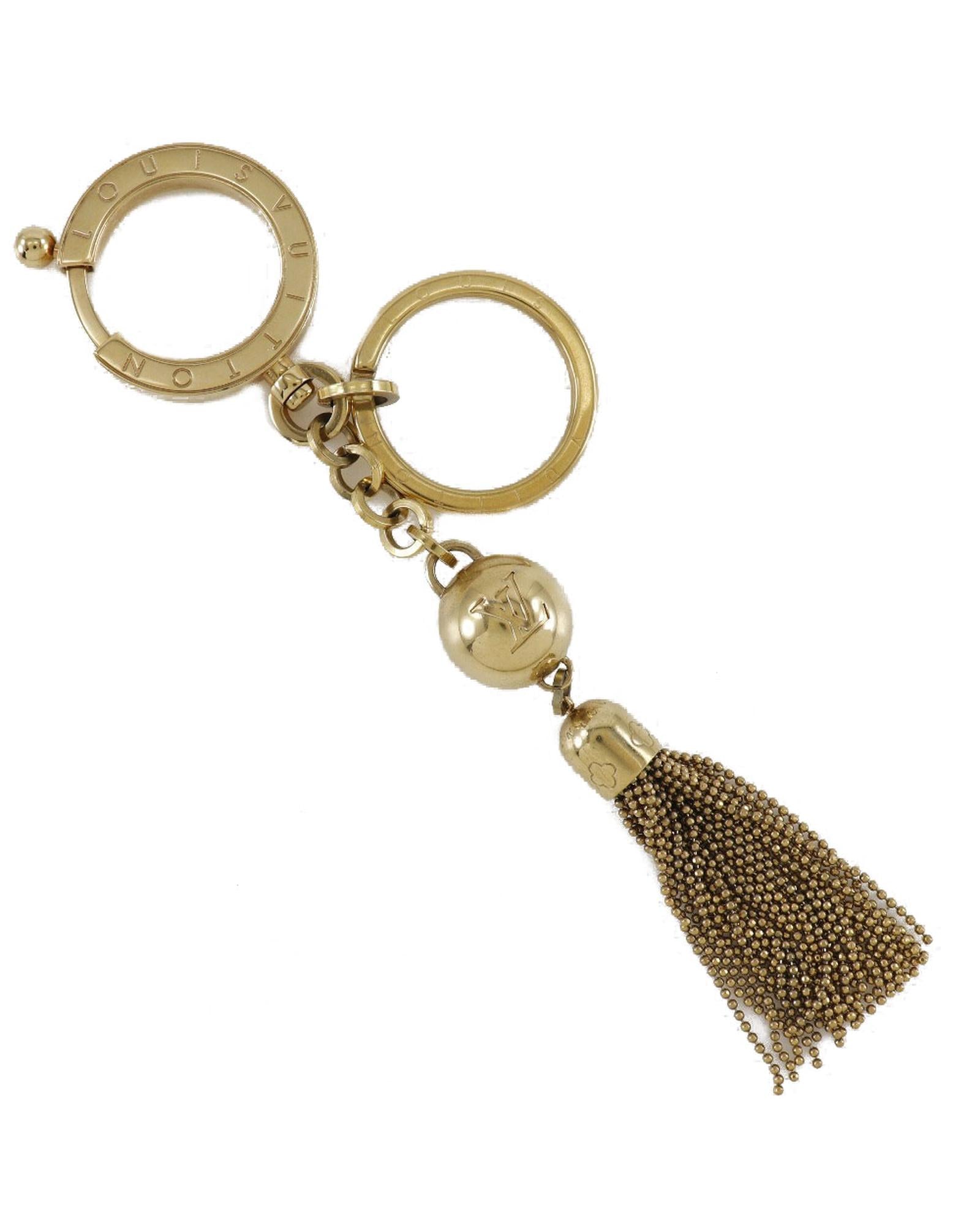 Image of Gold Swing Back Charm Key Accessory - AB Condition