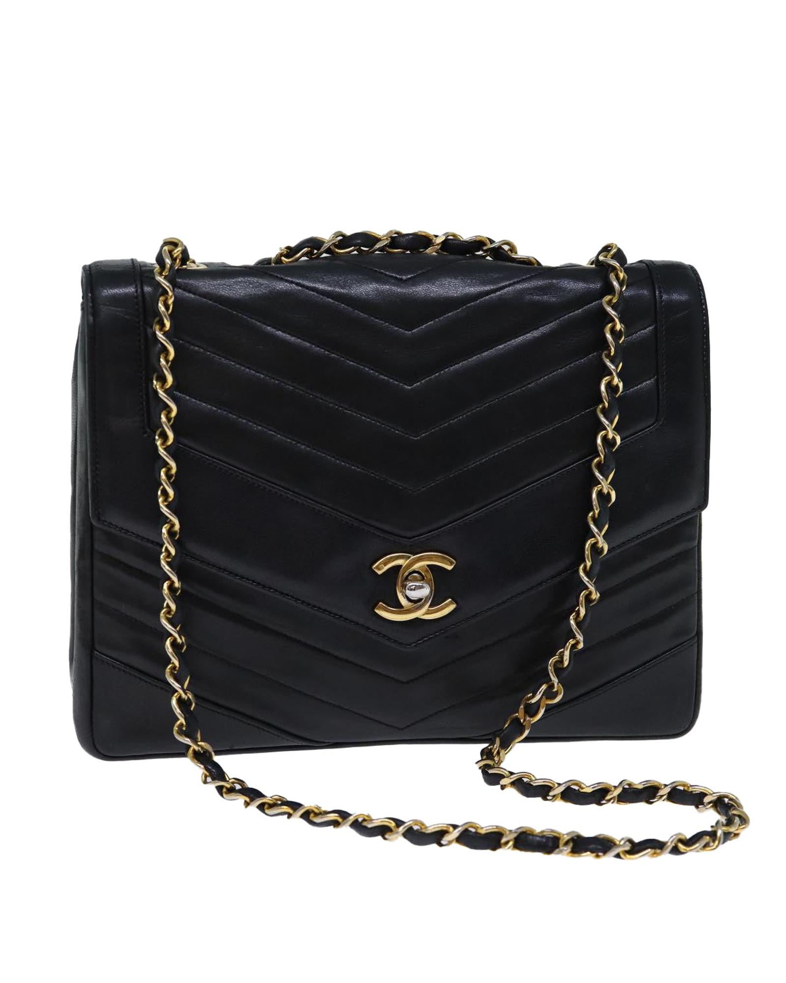 image of Black Lamb Skin Turn Lock Chain V Stitch Hand Bag by Chanel