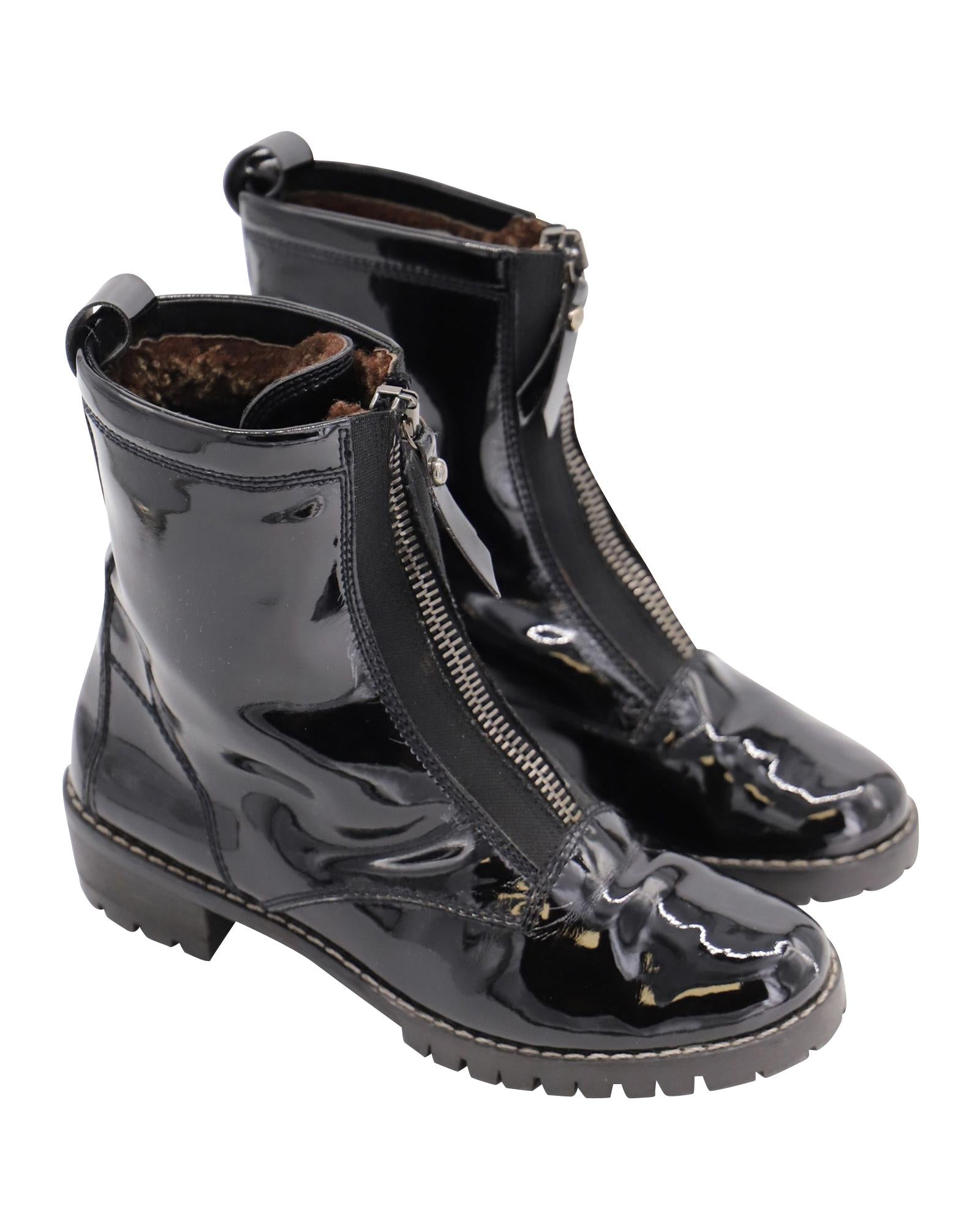 image of Stuart Weitzman Zip Up Boots in Black Patent