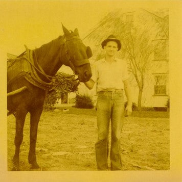 Founder of Stoltzfus Meats, Amos, with his horse