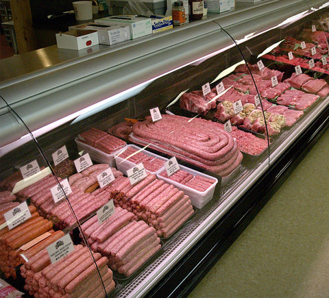 Stoltzfus Meats display case with various meat products