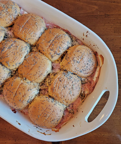 Baked Ham & Cheese Sliders in a casserole dish