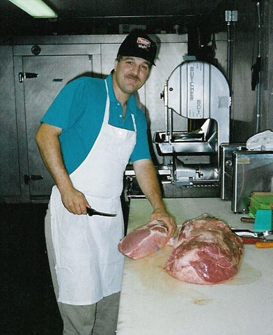 Myron Stoltzfus working at the shop