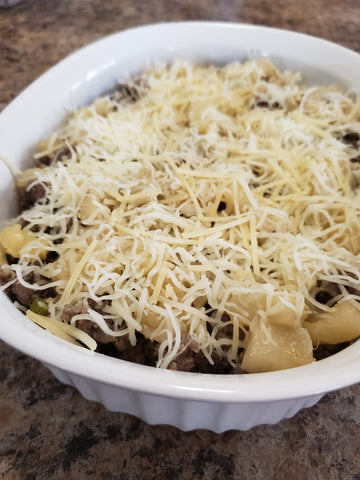 sausage mixture and apple mixture topped with grated cheeses