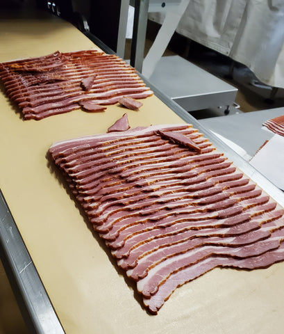 sliced bacon on a table