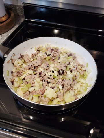 sausage, butter, celery, onion, apple, sage, and pepper in a large skillet