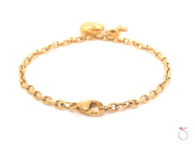 Tiffany & Co. Heart & Key Charm Bracelet in 18K Yellow Gold.