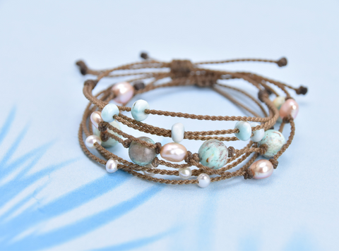 The Celestial Waves Bracelet stack is full of gemstones and freshwater pearls that will help you feel beautiful, bold and fearless on your next adventure.
