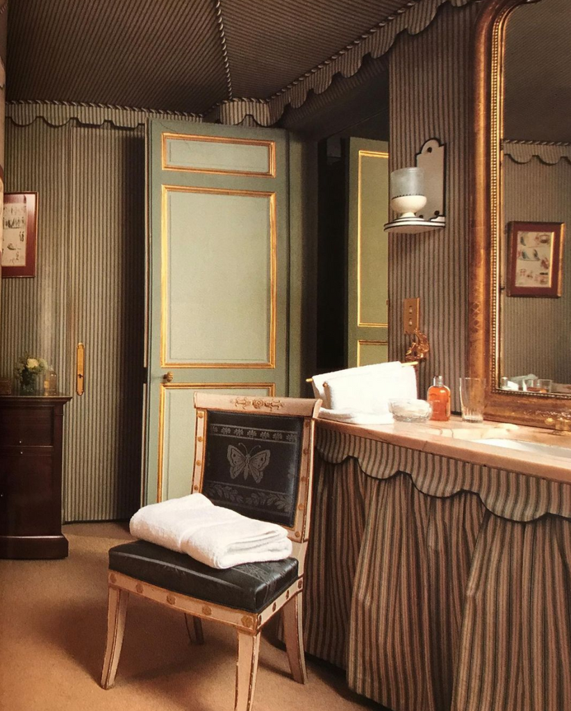 tented bathroom with striped patterns