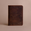 brown leather travel document holder