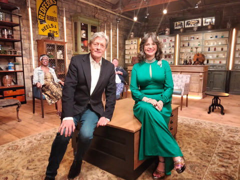 BBC1 The Bidding Room Episode 1 Series 3 Nigel Havers with Estelle Bilson of 70s House Manchester with Adrian Higham and Natasha Francis in background 