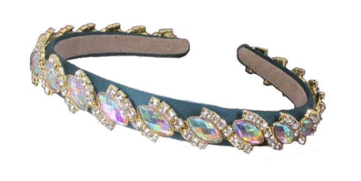 The Green crystal headband is beautiful and elegant. Iridescent rhinestones. Wear with a luxurious white dress or your favorite jeans and crop top. It always looks perfect. Is extremely comfortable and this headband makes a glamorous statement piece.