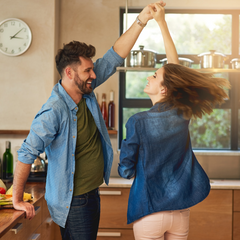 Couple dancing in kitchen