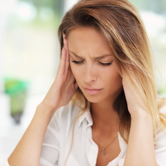 woman with a headache from histamine