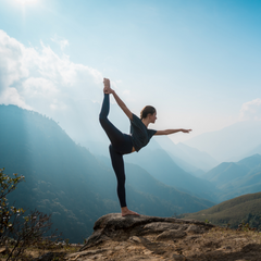 woman practicing yoga in the mountains