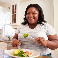 woman with PCOS eating nutritious foods
