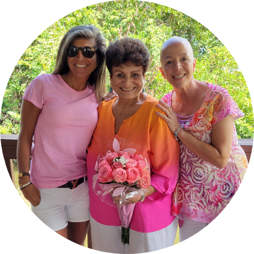 Laura Duksta smiles with her mother and sister on Mother's Day.