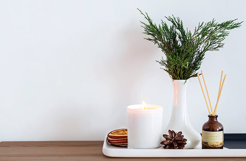 botanical decor from your yard with candles and seasonal scents