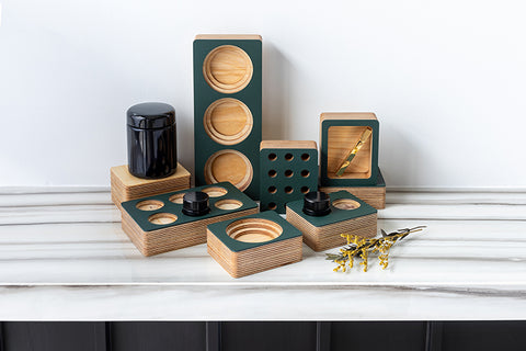 Forti Goods wood accessories for organization within our lockable furniture. This image shows our large glass jars, and various 1/3, 2/3 and 3/3 sized organization blocks with conifer green linoleum accents.