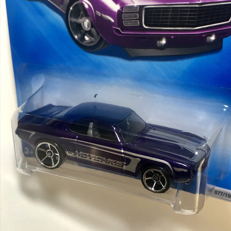 2009 Hot Wheels Muscle Mania 69 Camaro morado OH5