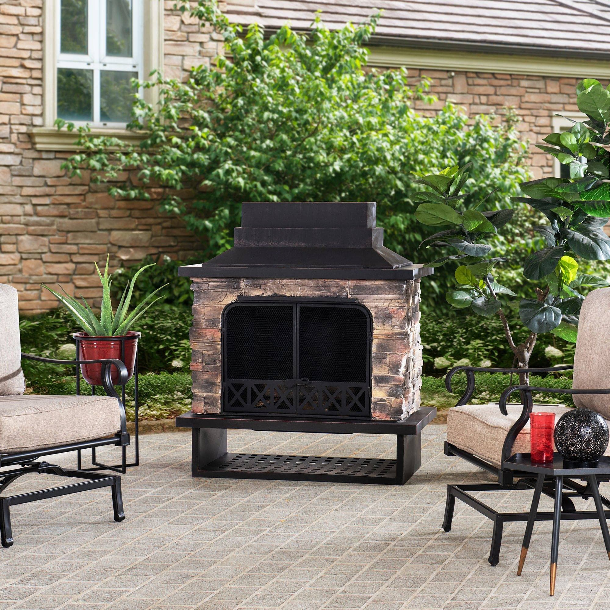 Sunjoy Outdoor 48 in. Black Steel Wood Burning Stone Fireplace with Fire Poker and Removable Grate