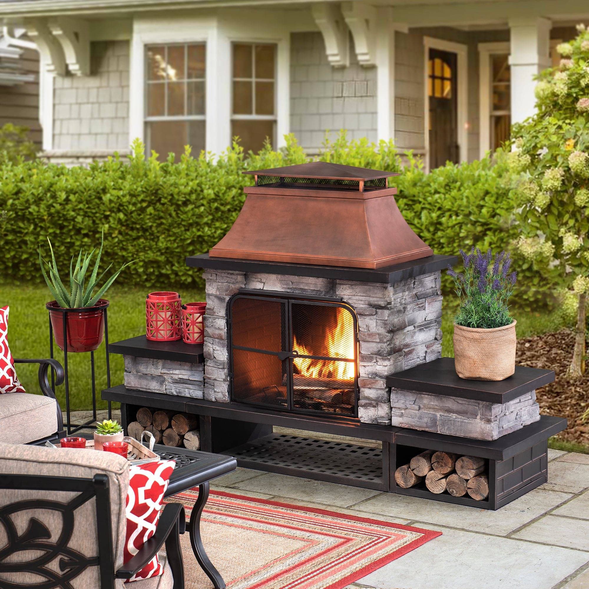 Sunjoy Outdoor 48 in. Steel Wood Burning Stone Fireplace with Fire Poker and Removable Grate