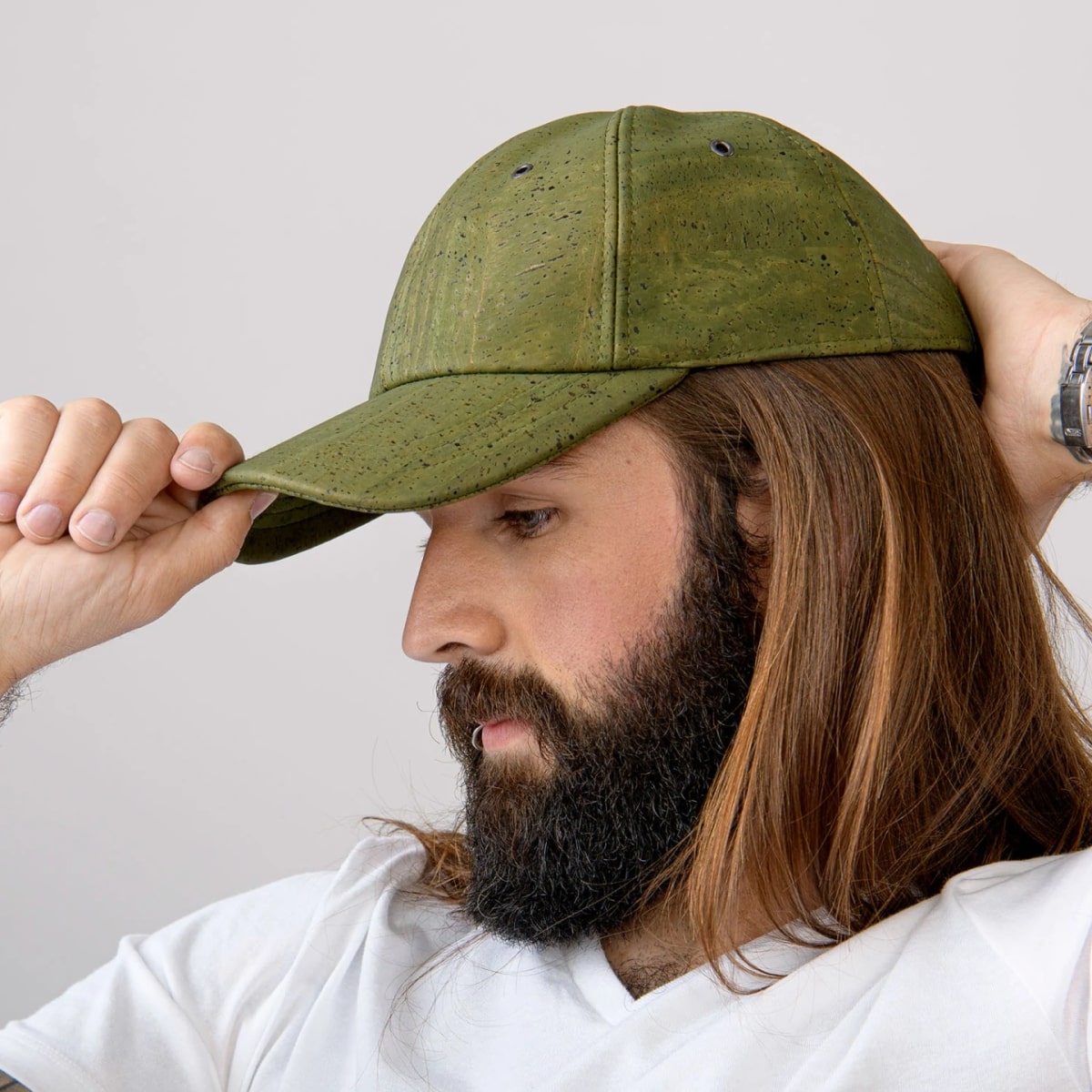Day In Day Out Sustainable Cork Baseball Hat in green shown on bearded man