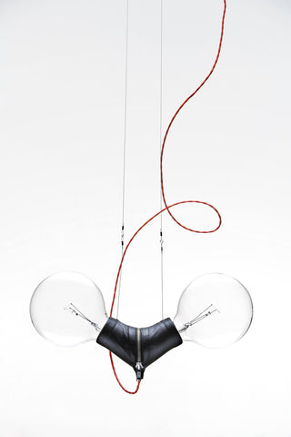 Hanging leather pendant with zips a collaboration between Santha King and Volker Haug