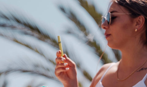 Woman Smoking CBDfx Vape